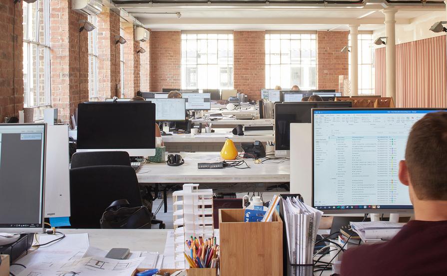 Desk spaces in bright architectural practice Desk spaces in bright architectural practice