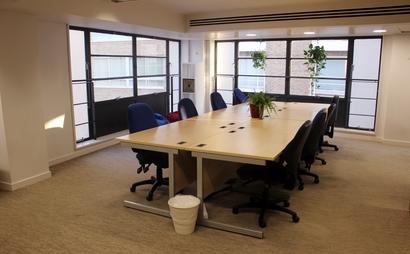 Bright deskspace in freindly office by the river Bright deskspace in freindly office by the river