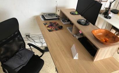 Sit/stand desk in 4-person shared workspace Sit/stand desk in 4-person shared workspace