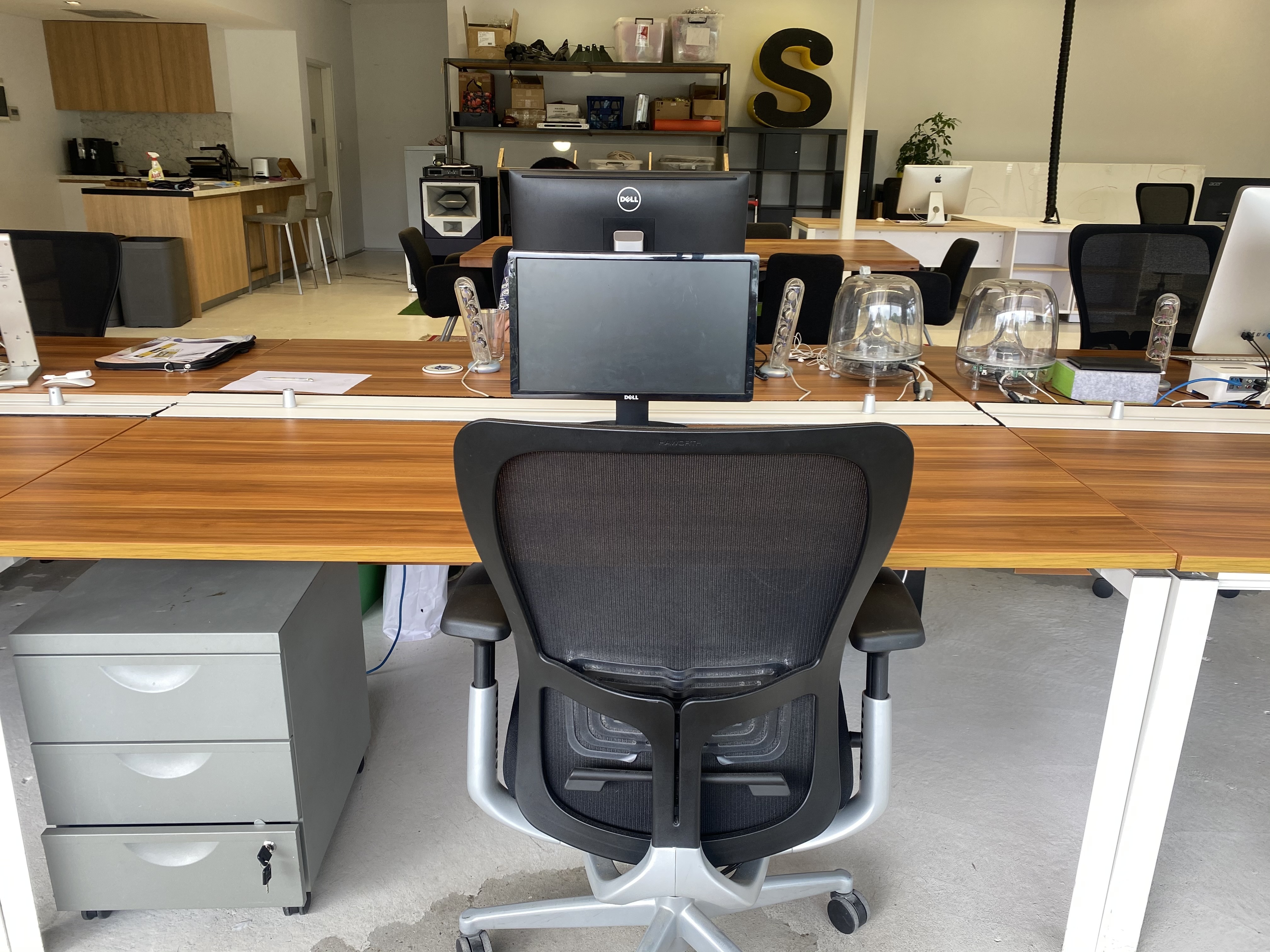 Private desk in shared workspace