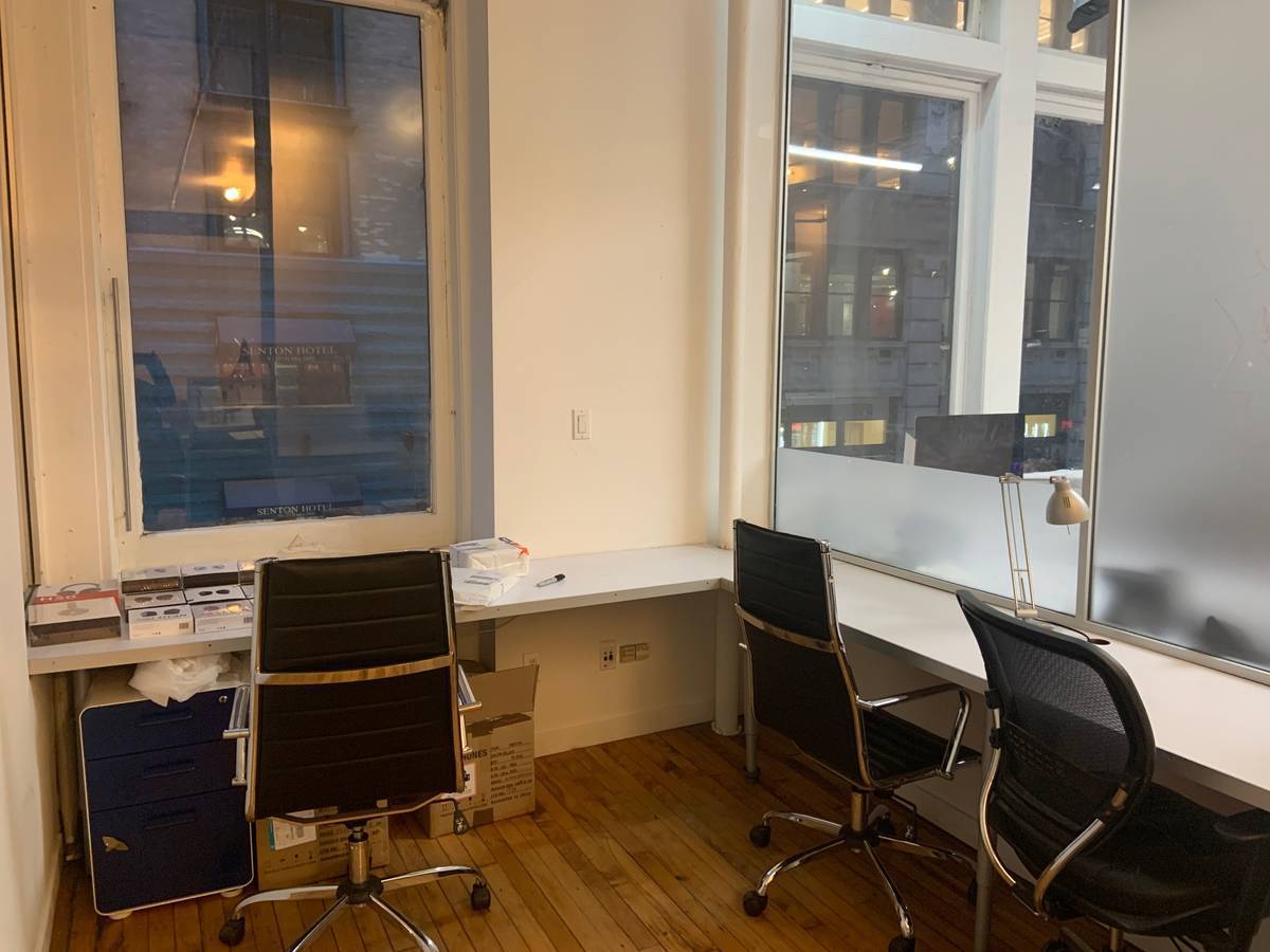 Private Office 1 with large windows (easily accommodates 2-3 people) 