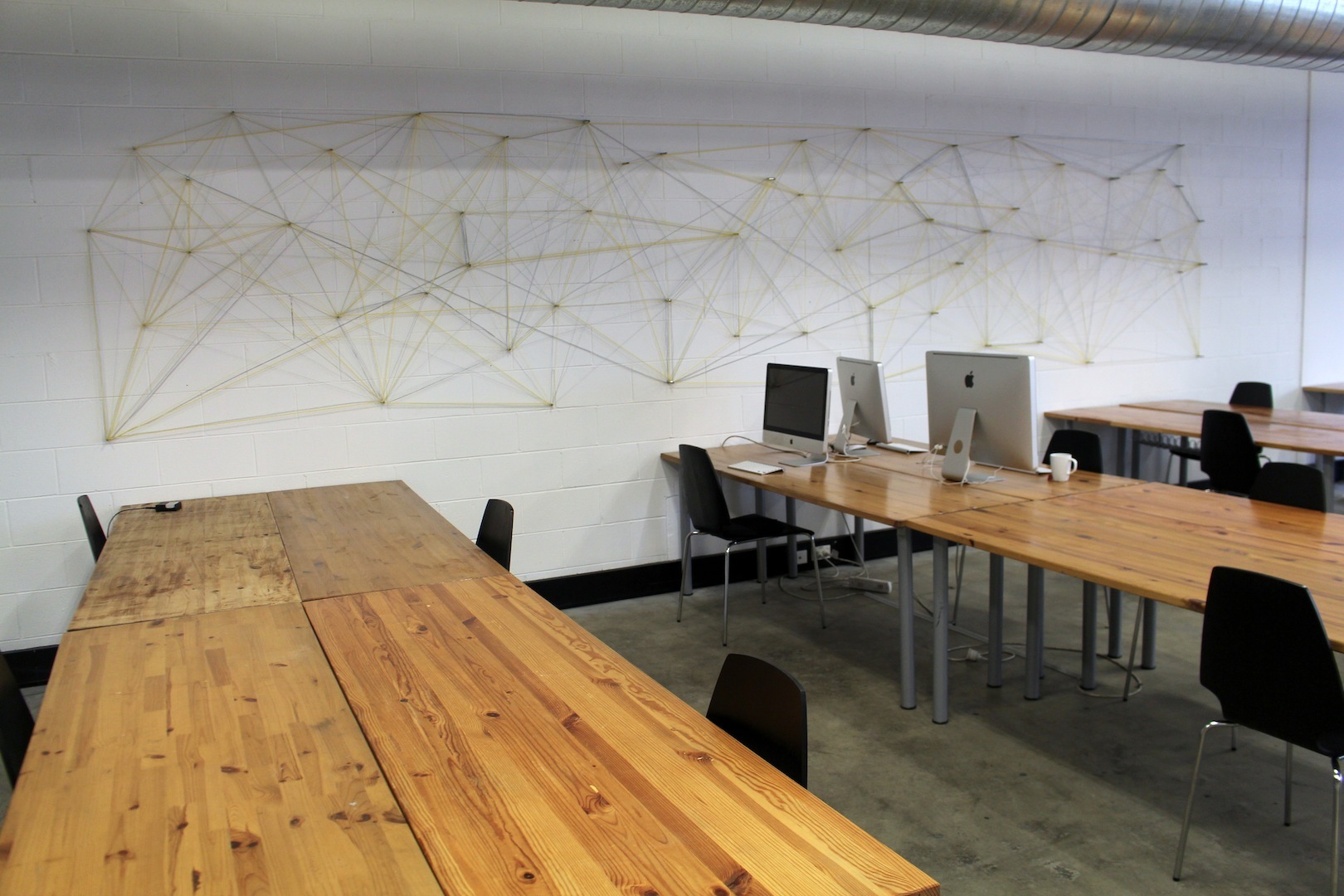 Coworking desk space at the Common Room