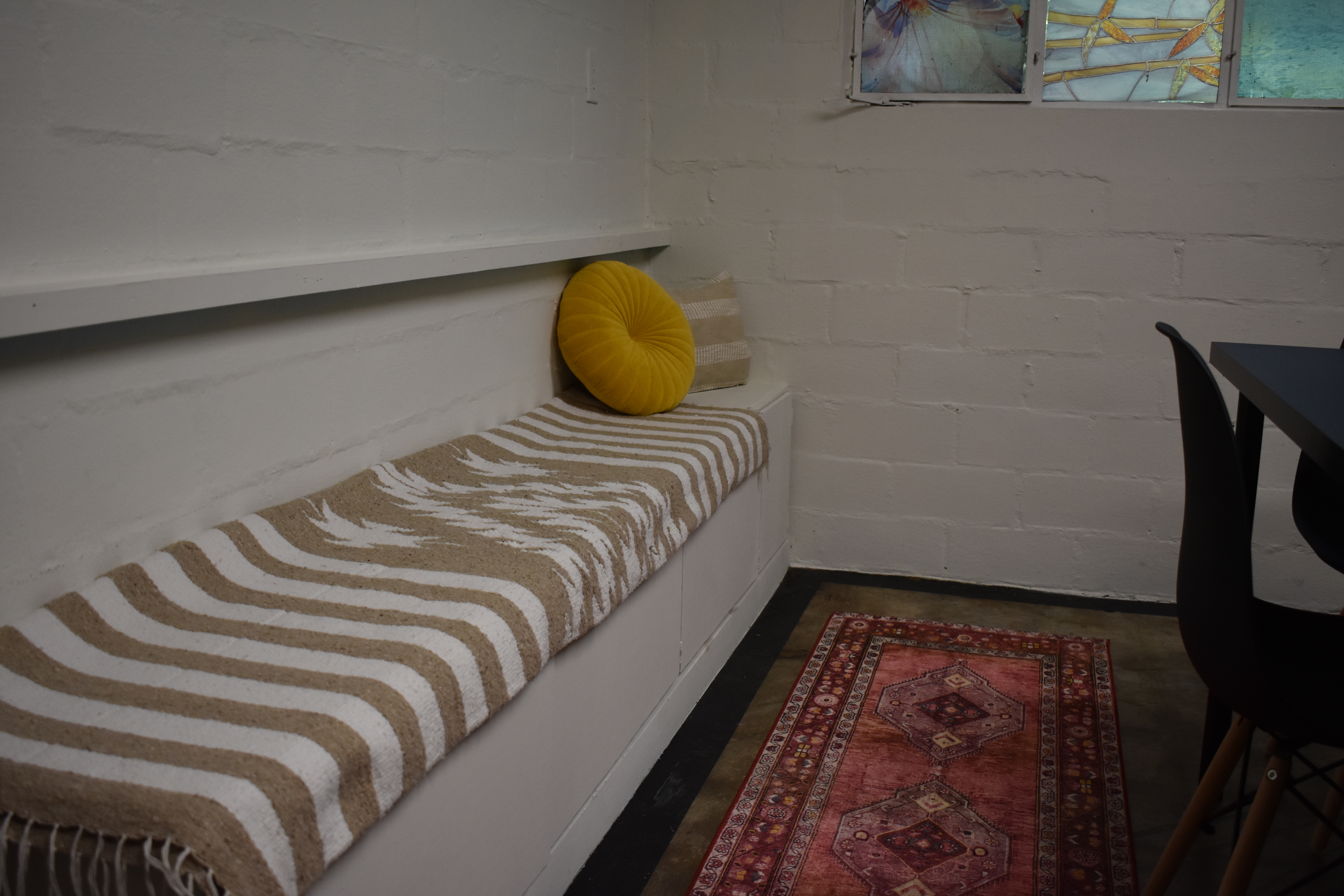 Cozy meeting space with modern touches and free on-site parking.