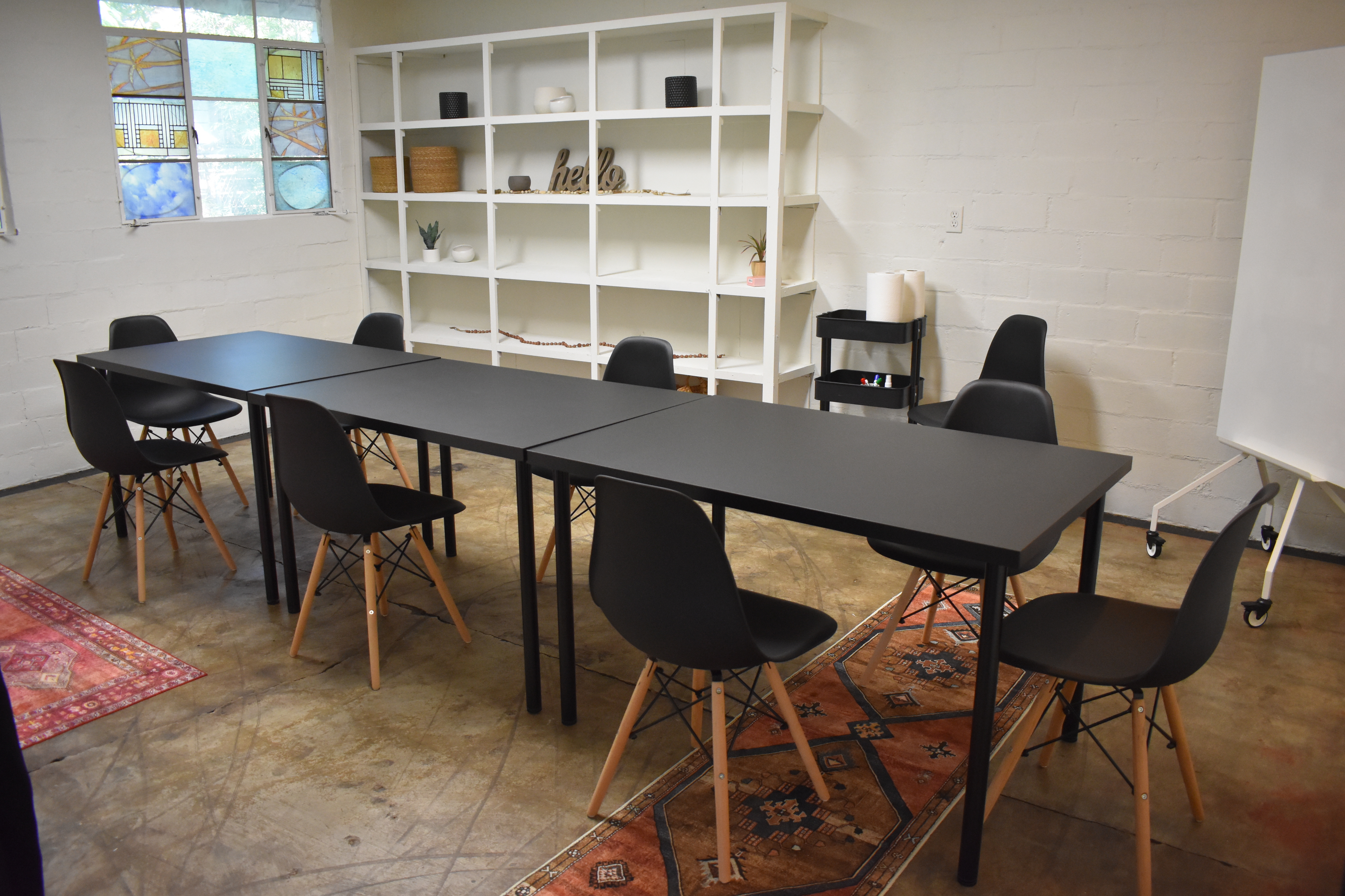 Cozy meeting space with modern touches and free on-site parking.