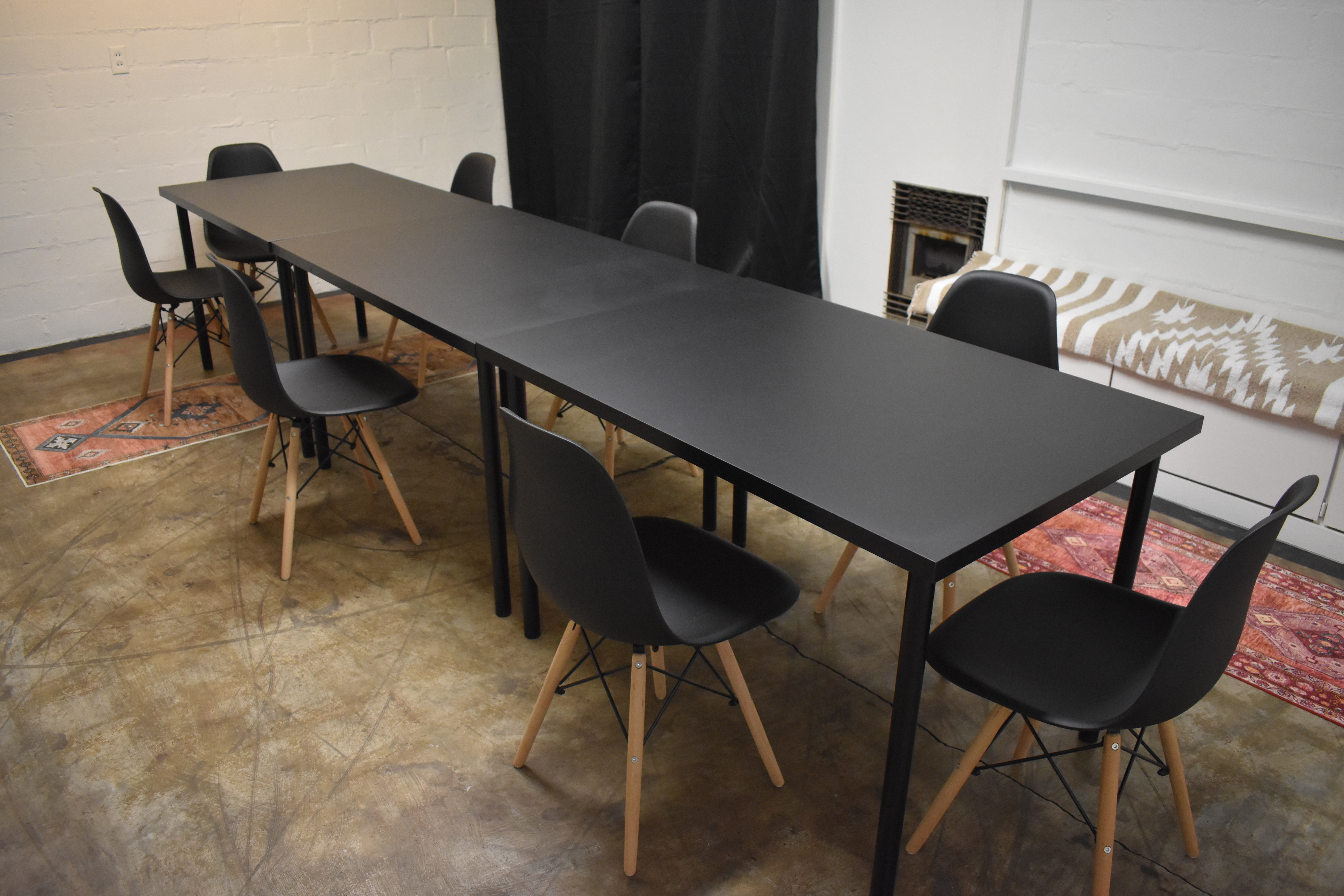 Cozy meeting space with modern touches and free on-site parking.