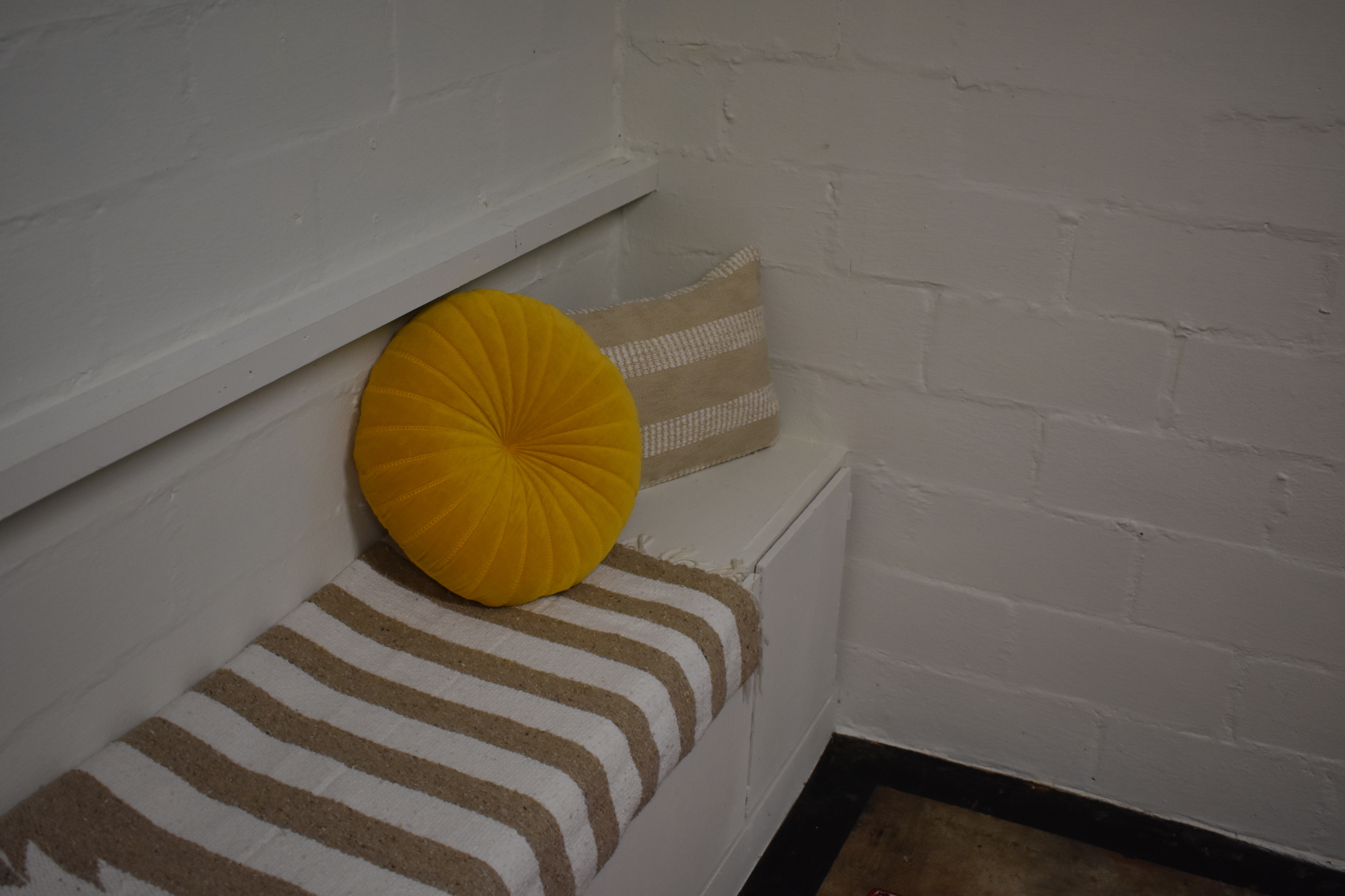 Cozy meeting space with modern touches and free on-site parking.