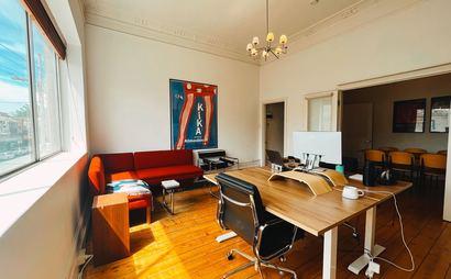 Individual desk spaces in creative studio Individual desk spaces in creative studio