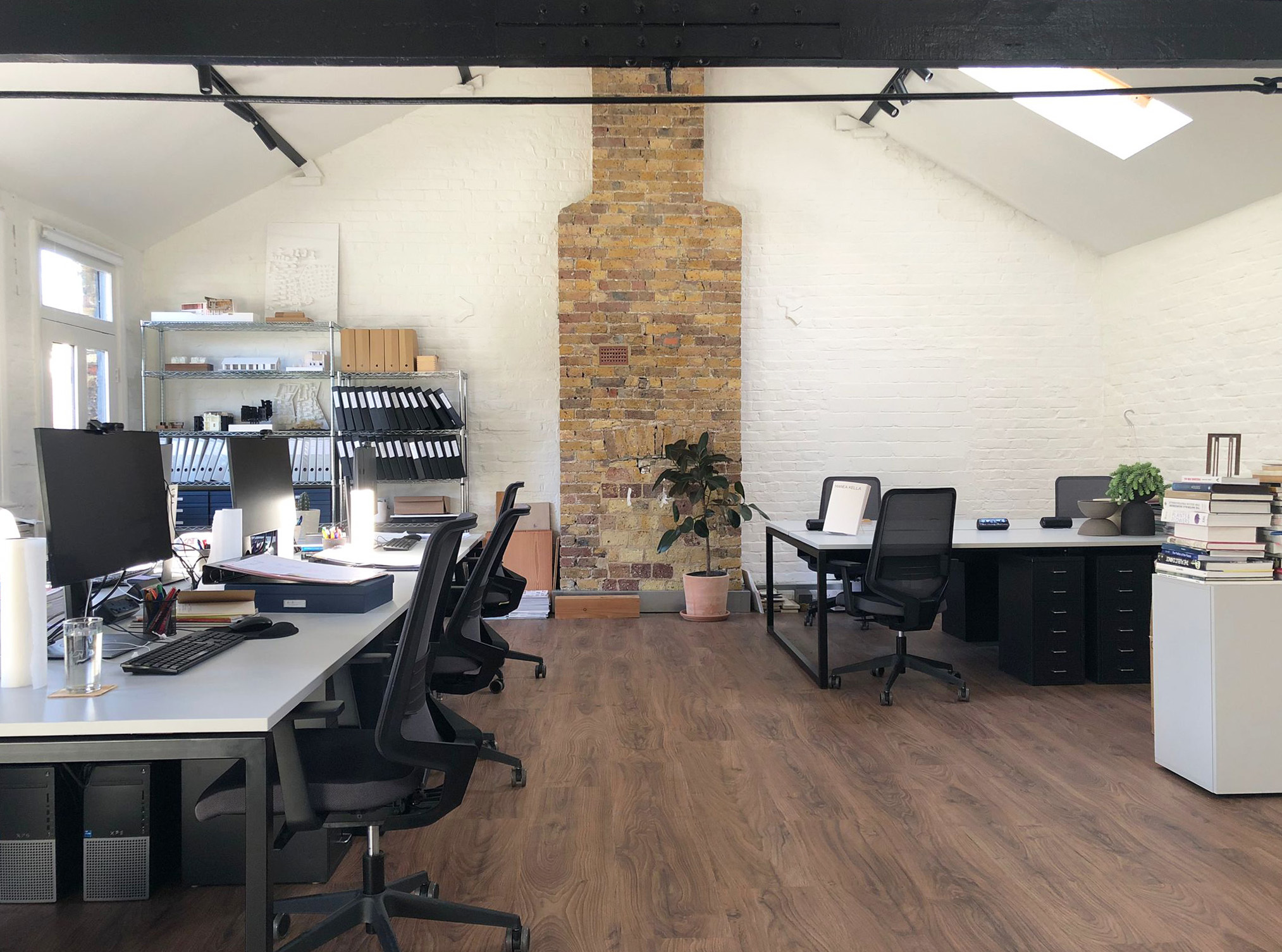 Four desks in a bright, creative warehouse studio in the heart of Queens Park Four desks in a bright, creative warehouse studio in the heart of Queens Park