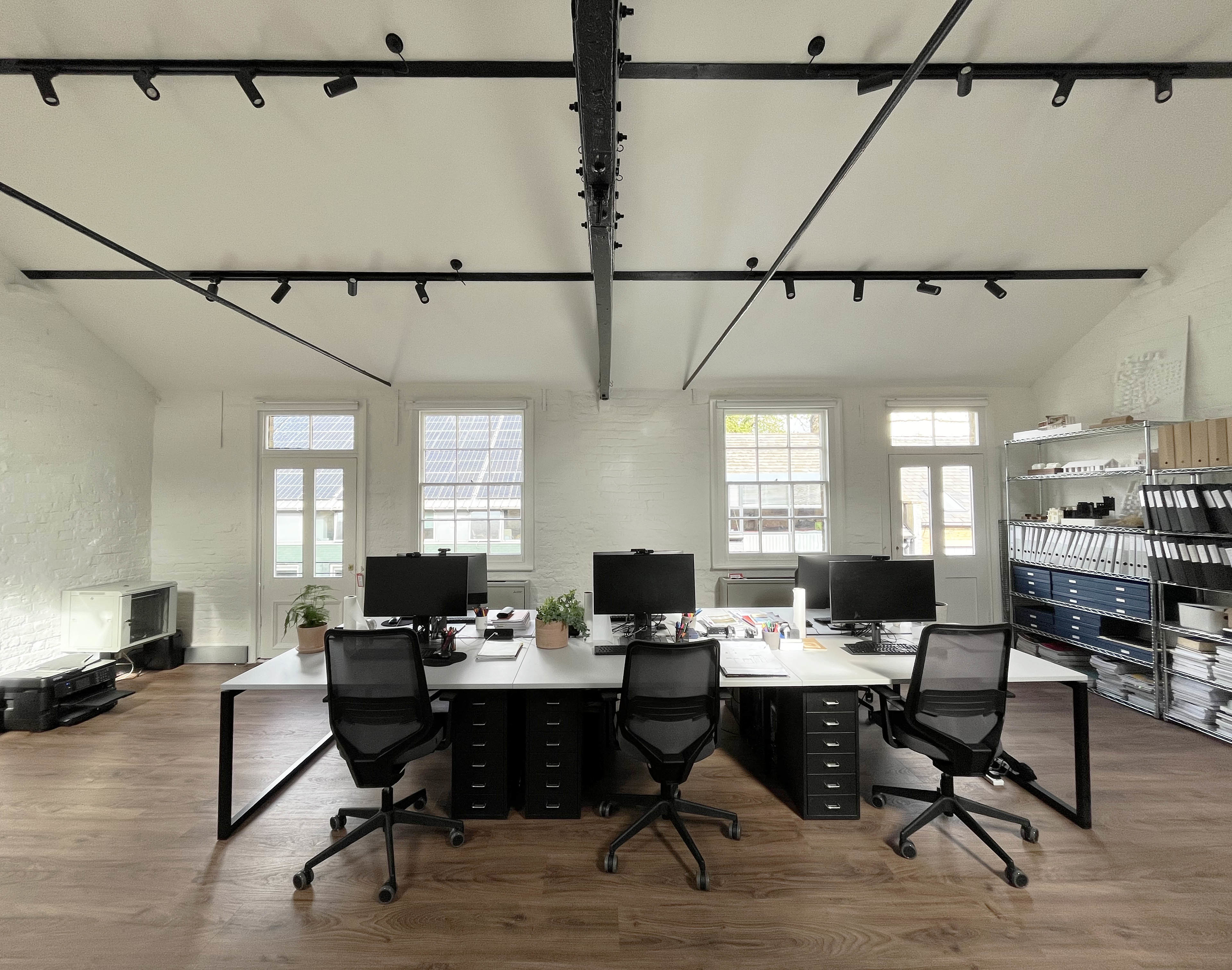 Four desks in a bright, creative warehouse studio in the heart of Queens Park Four desks in a bright, creative warehouse studio in the heart of Queens Park