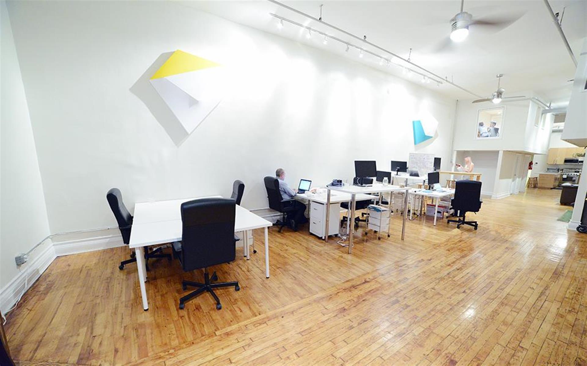 desks in an amazing office space