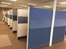 Desk space for rent in a shared office space plus round tables meeting space