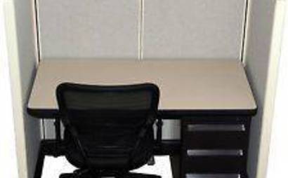 Desk space for rent in a shared office space plus round tables meeting space