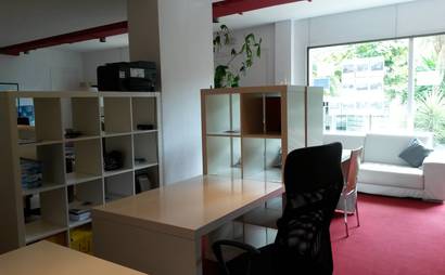 Open Desks in bright workspace Open Desks in bright workspace
