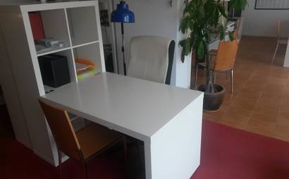 Open Desks in bright workspace Open Desks in bright workspace