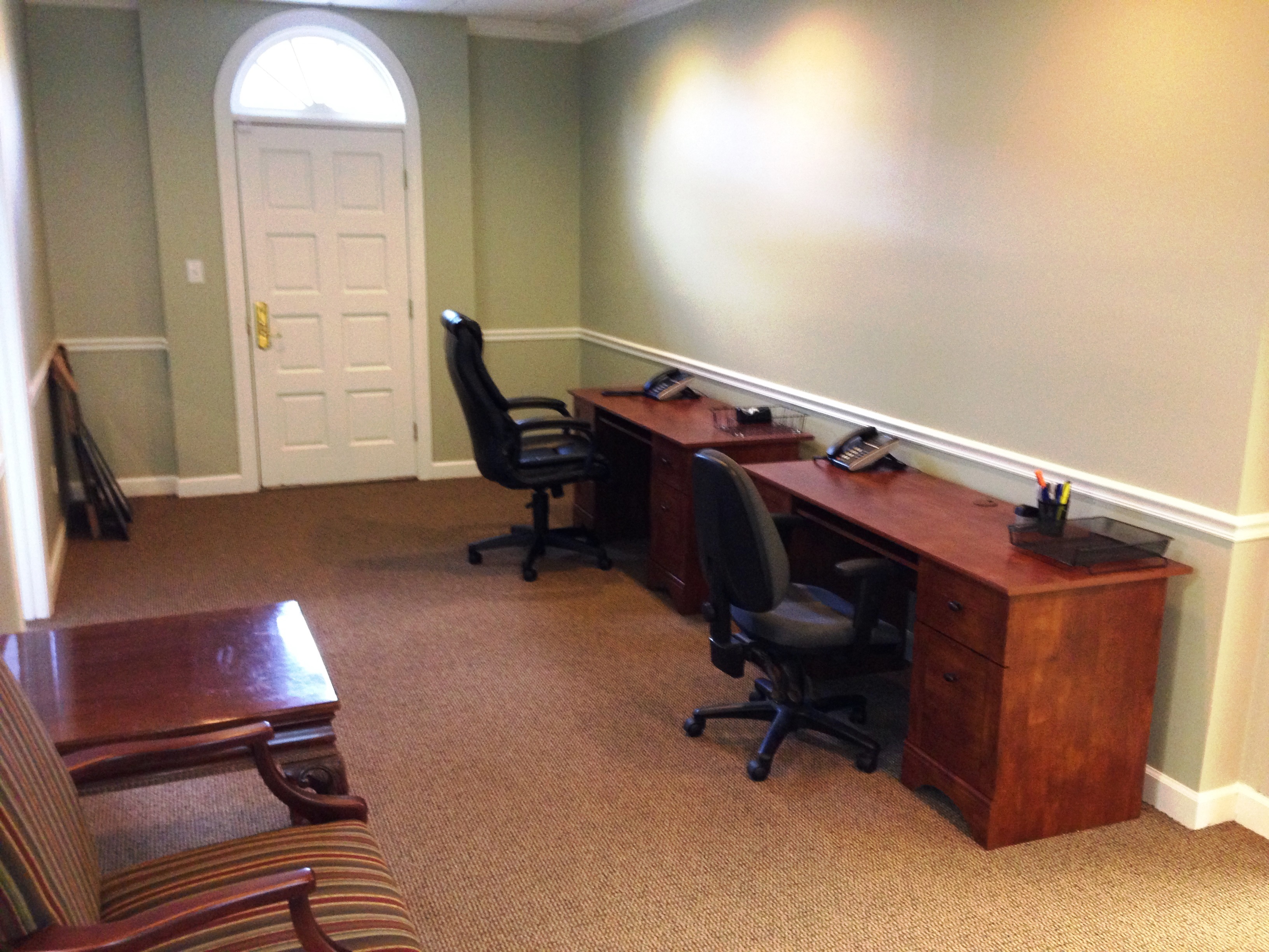 Two Desks in Large Room