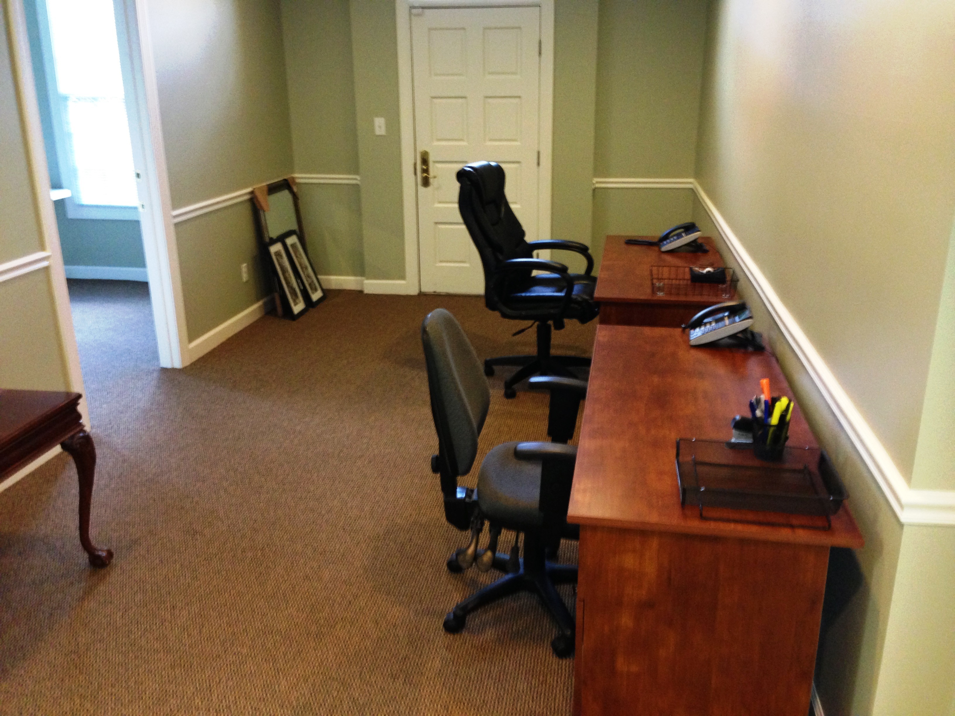 Two Desks in Large Room