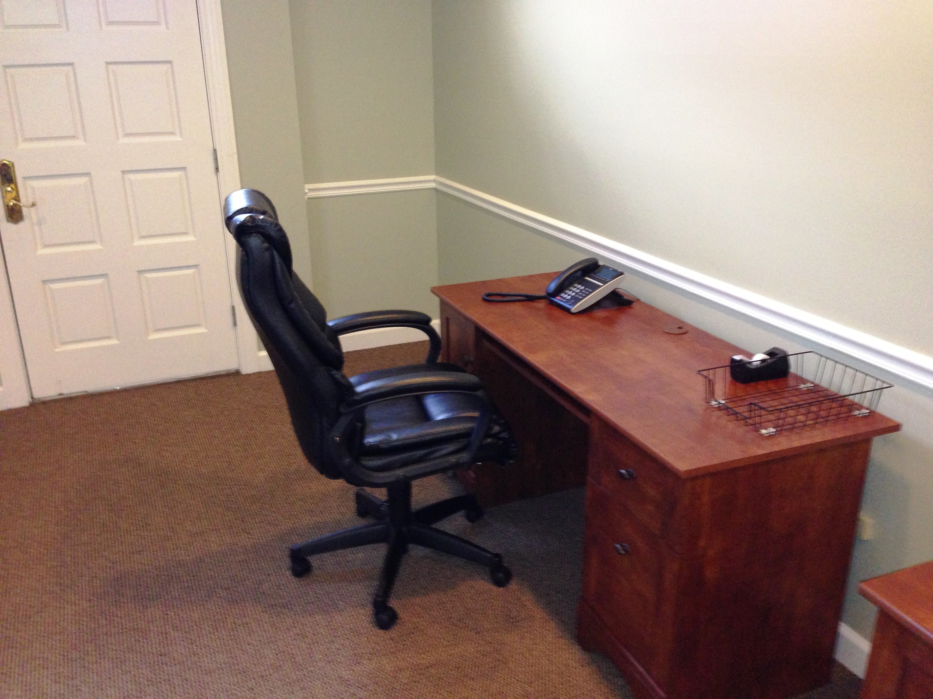 Two Desks in Large Room