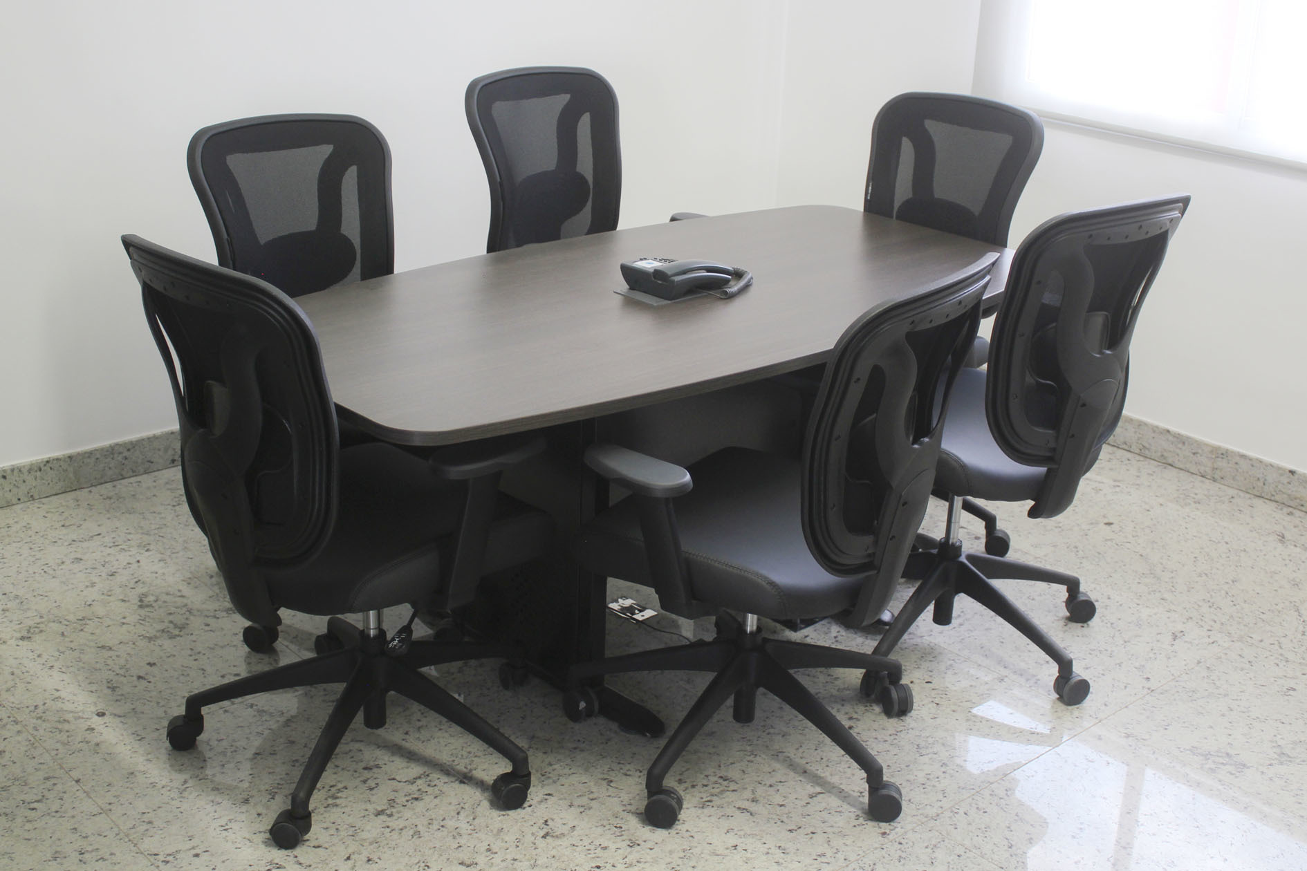 Work stations with private desks, meeting room