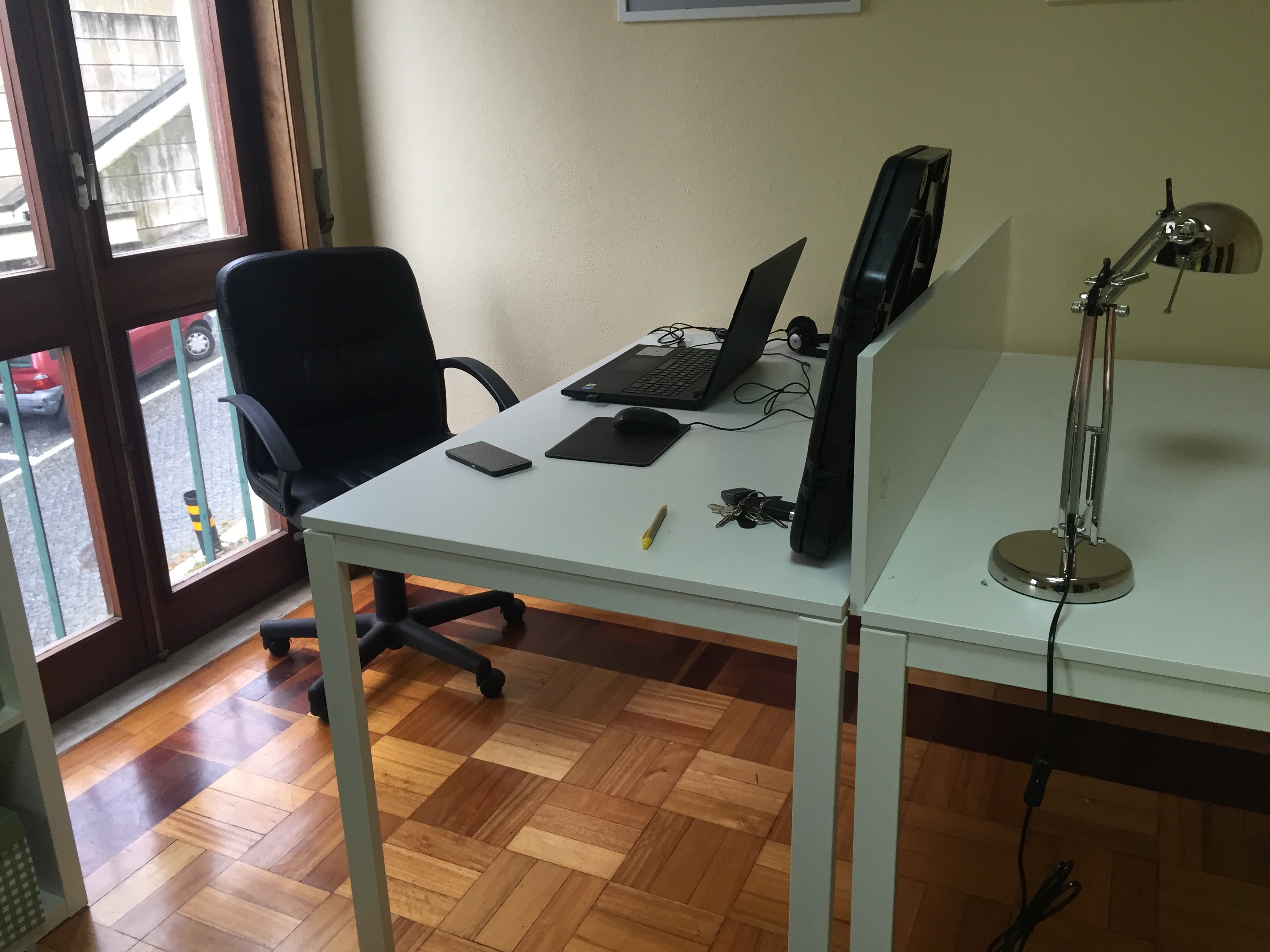 Private desk in small collaborative space