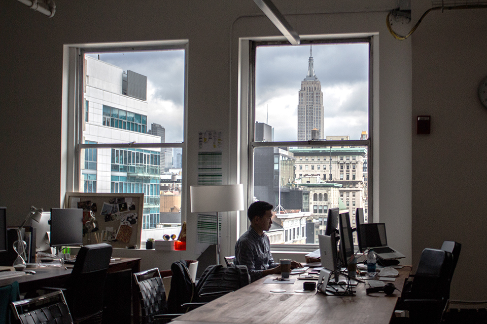 Individual desks in a spacious and bright communal loft Individual desks in a spacious and bright communal loft