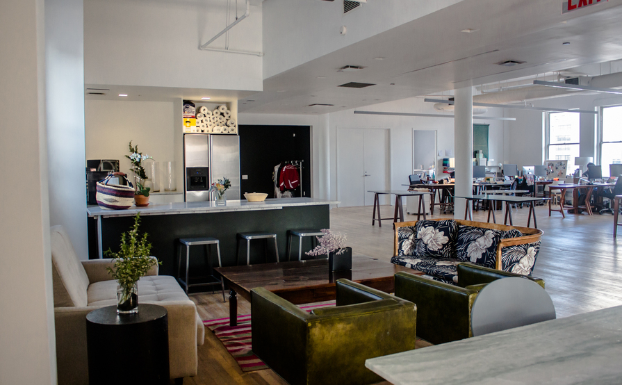 Individual desks in a spacious and bright communal loft Individual desks in a spacious and bright communal loft
