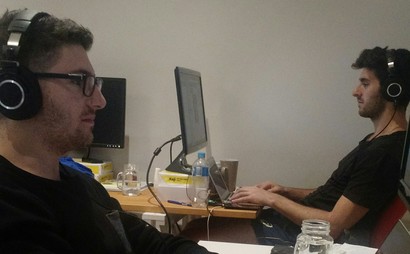 Creative work space with a growing startup Creative work space with a growing startup