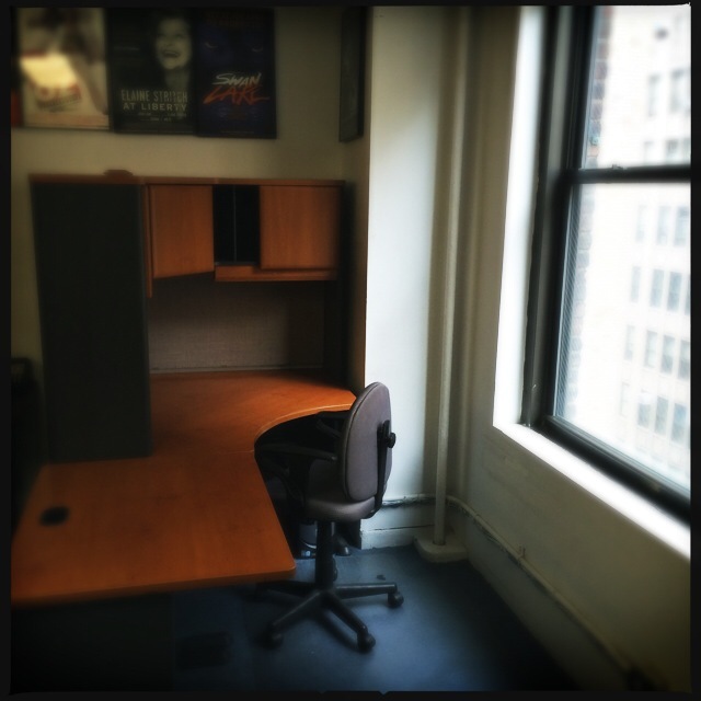 Corner Desk Unit With Ample Overhead Storage