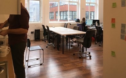 Island of five desks in office Island of five desks in office
