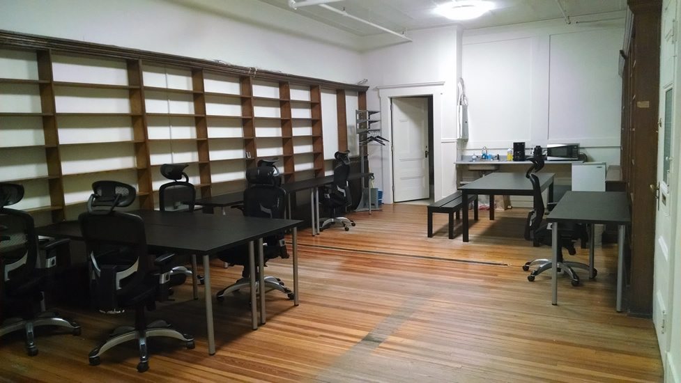 Open desks and tables in coworking space