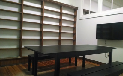 Open desks and tables in coworking space Open desks and tables in coworking space