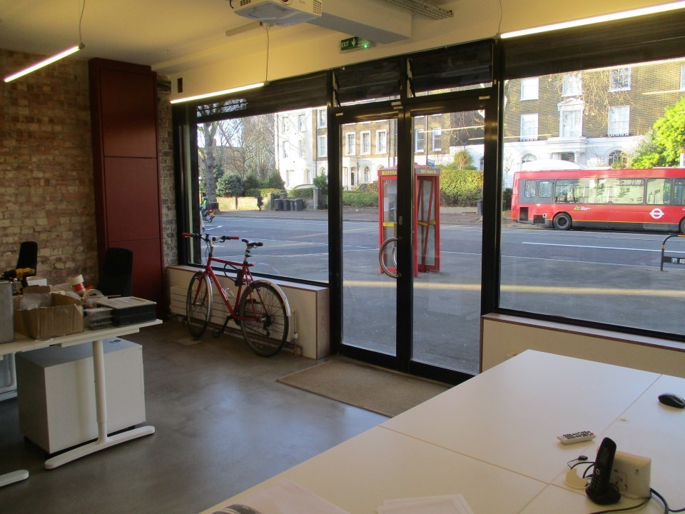 Comfortable desk, chair and cabinet in shared secure studio work space  