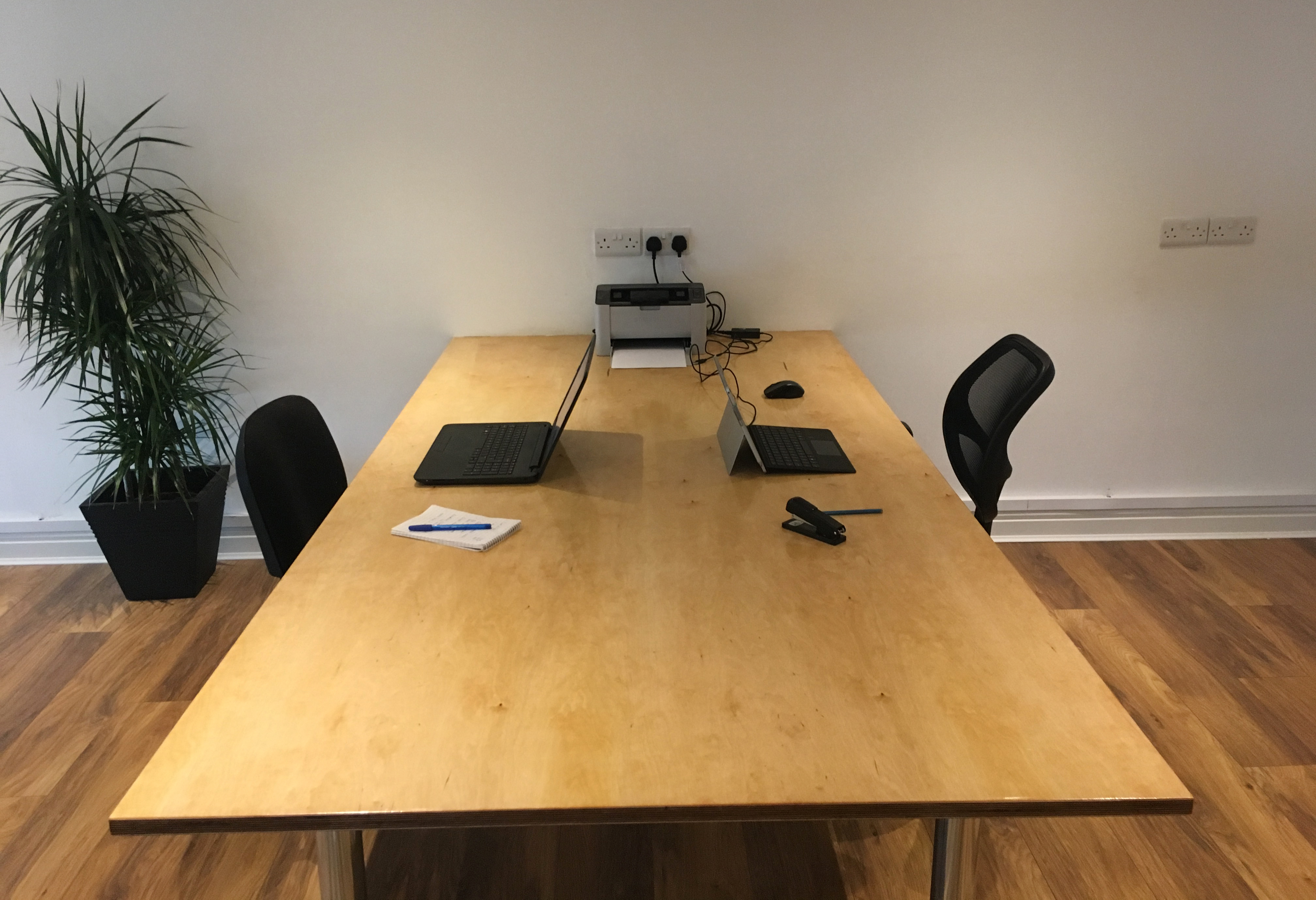 A large 2m wide desk in a quiet working enviornment