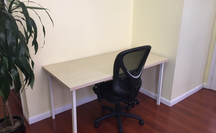 Desk in Spacious and Brightly-Lit Corner of a Midtown Animation Studio