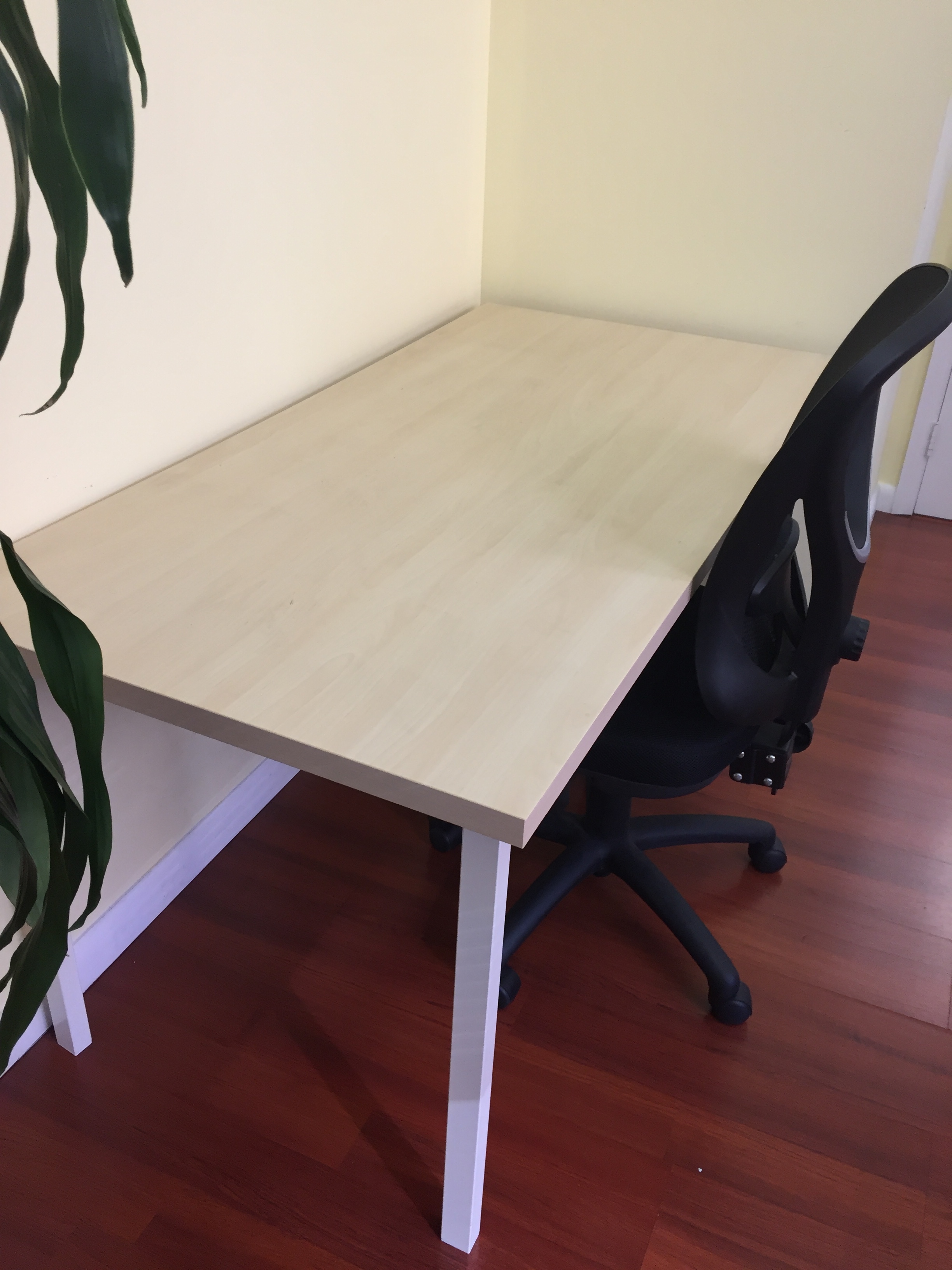 Desk in Spacious and Brightly-Lit Corner of a Midtown Animation Studio