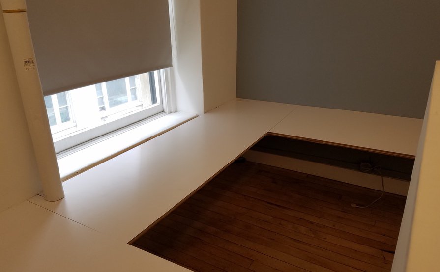Semi-private corner workspace in quiet creative office Semi-private corner workspace in quiet creative office