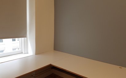Semi-private corner workspace in quiet creative office Semi-private corner workspace in quiet creative office