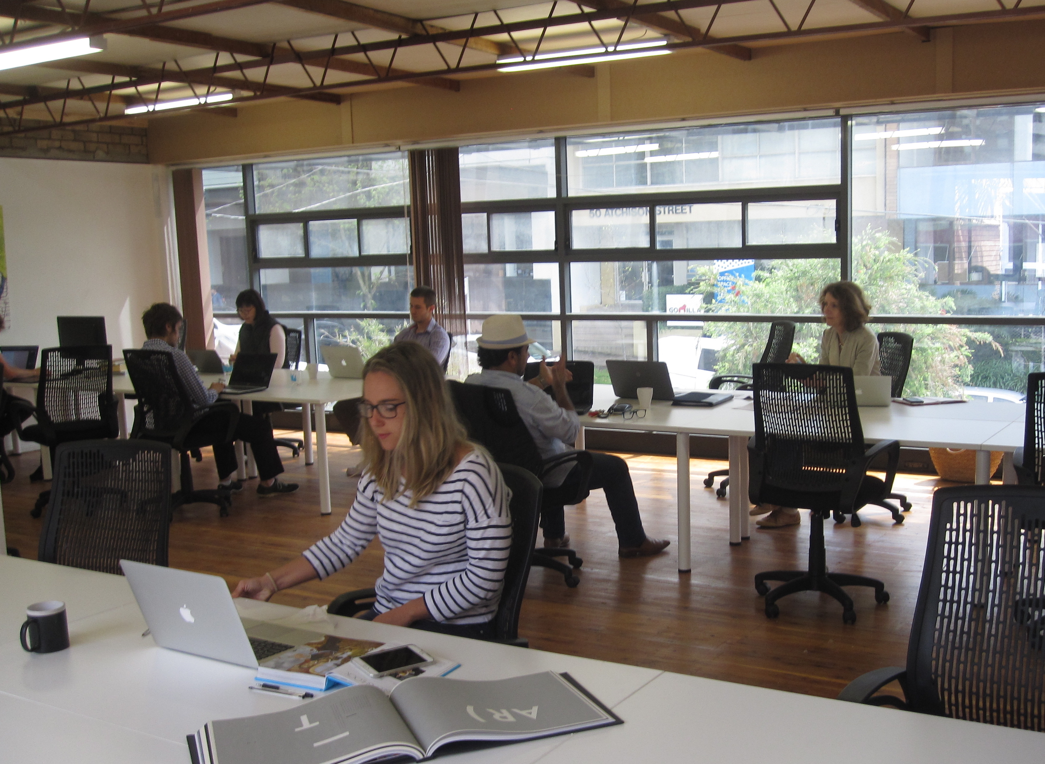 Dedicated desk in open plan office