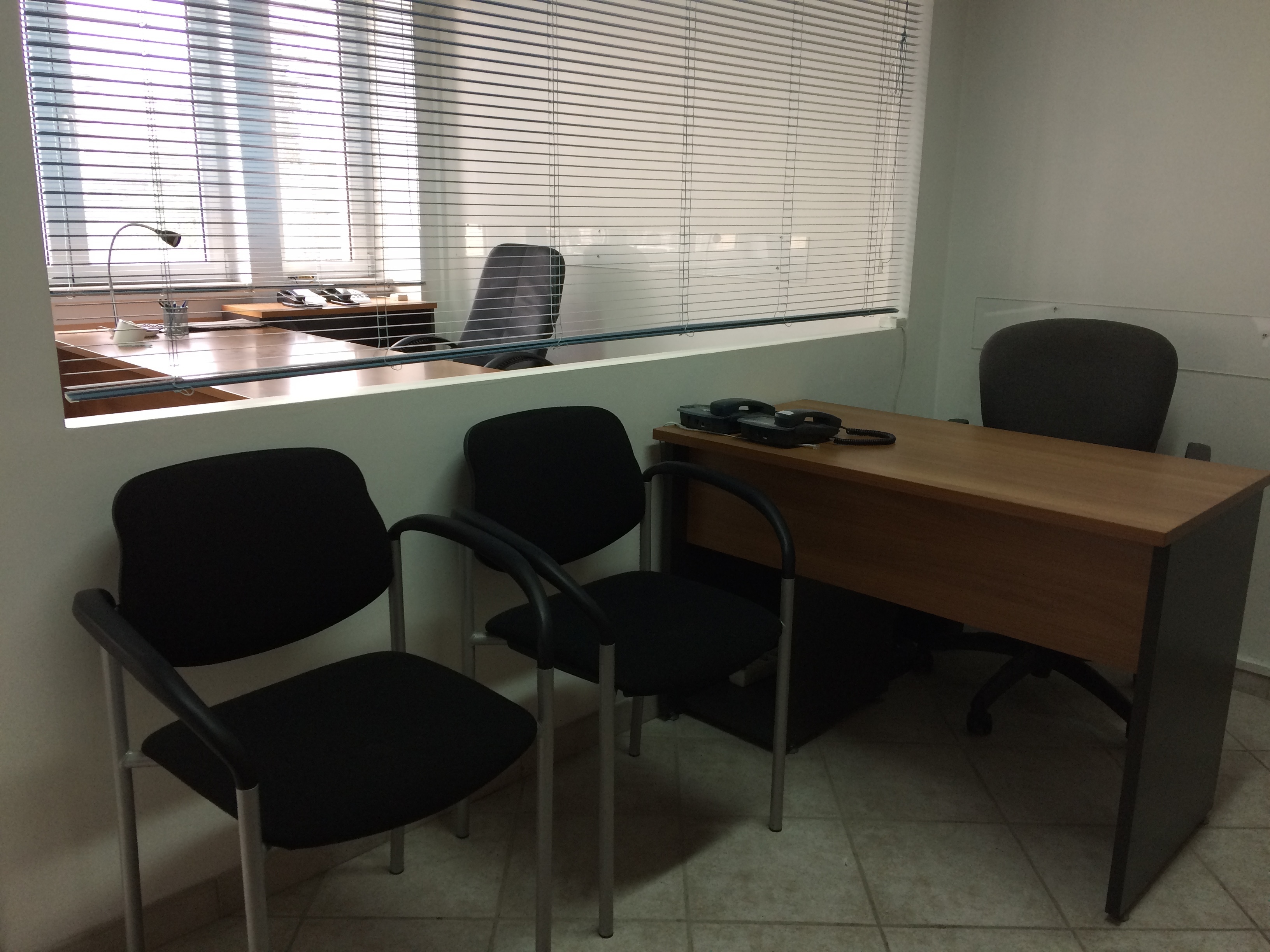 Bright fully equipped and furnished private office.