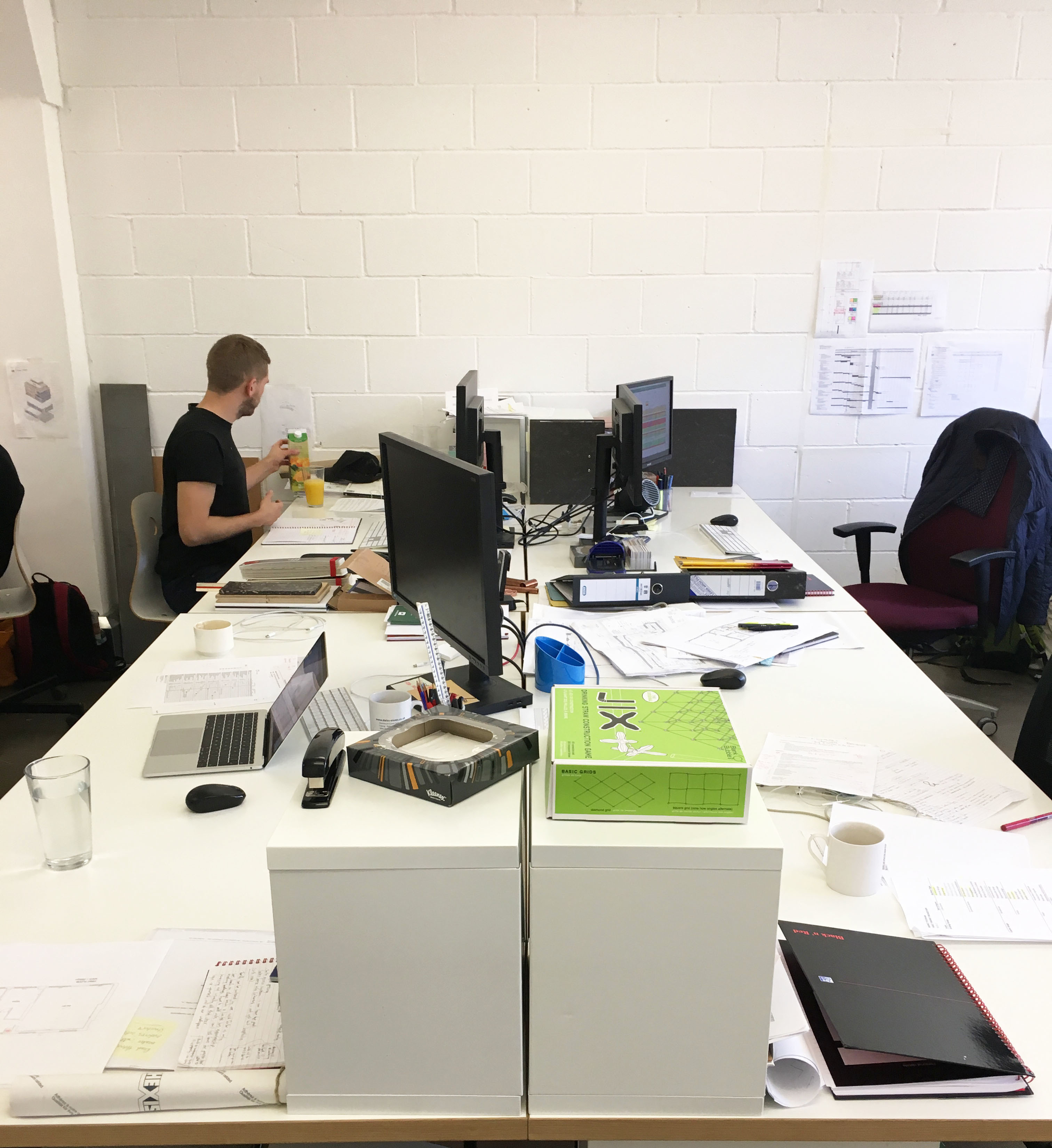 Large desks in bright period building