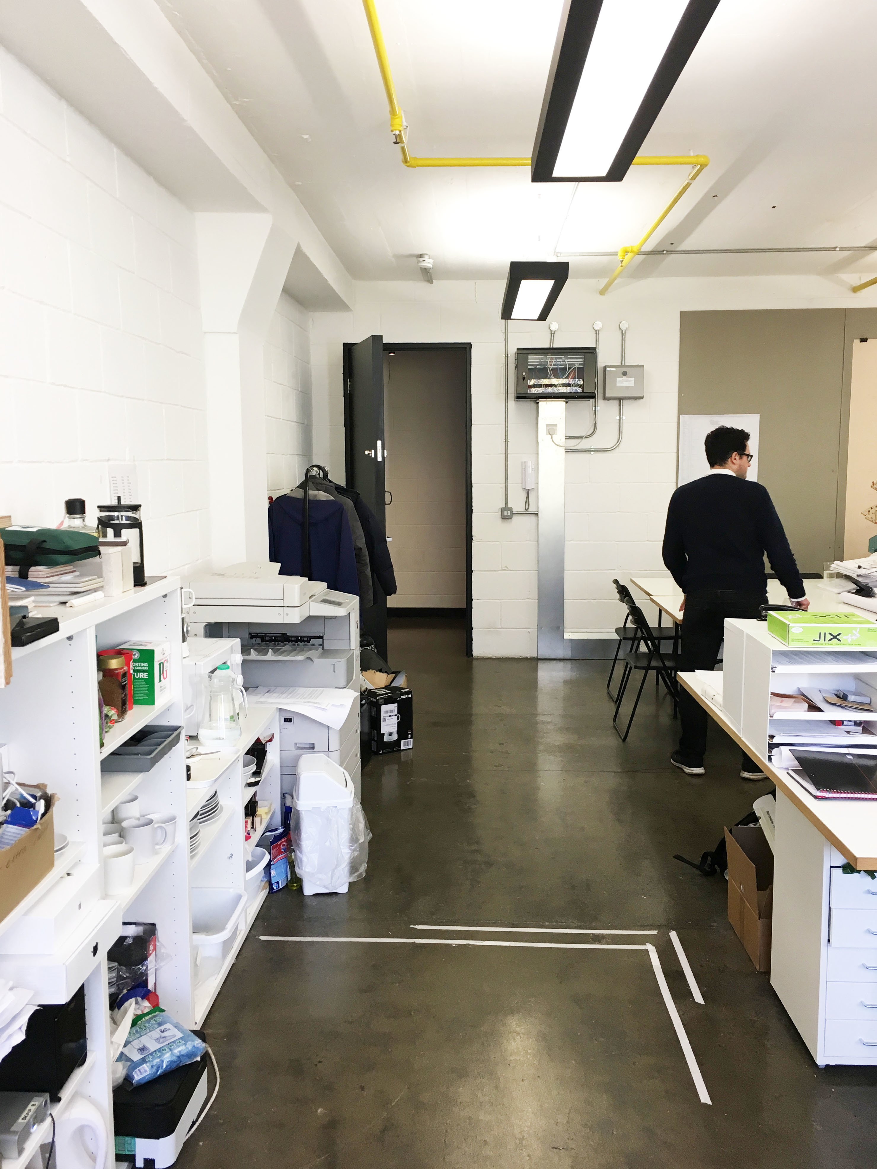 Large desks in bright period building