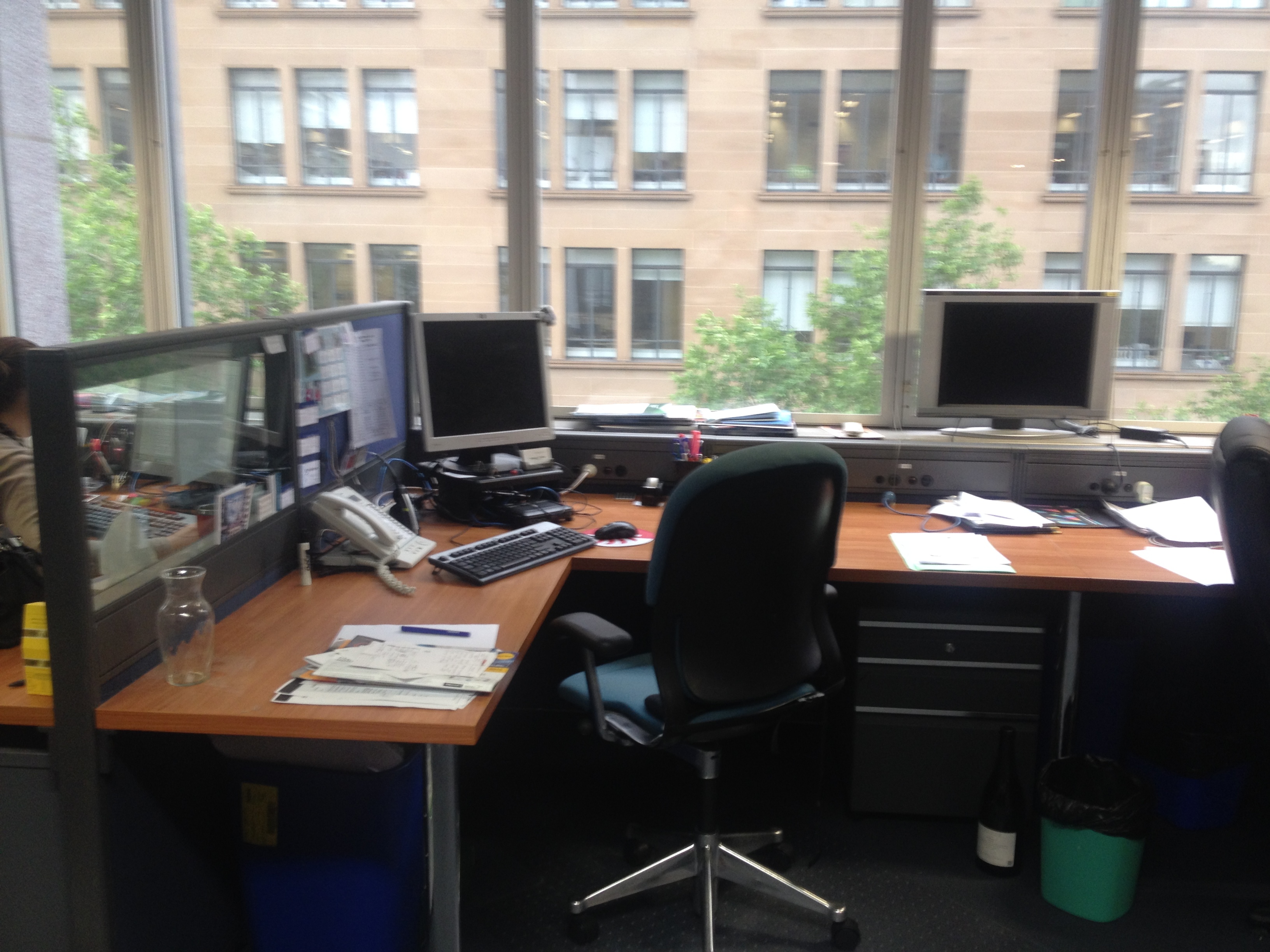 Large desk with plenty of space for storage.