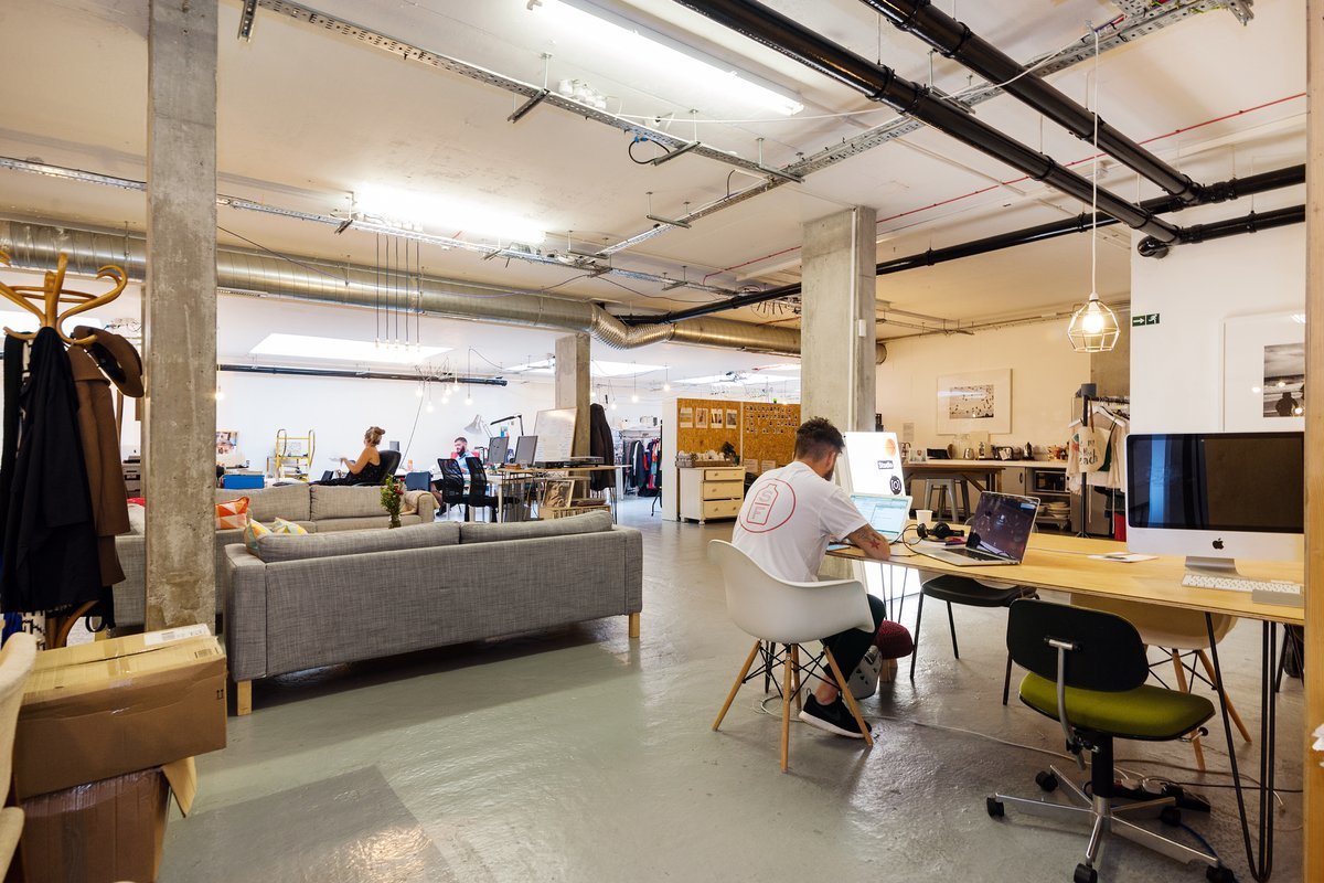 Co-working desk space, second home for creative freelancers Co-working desk space, second home for creative freelancers