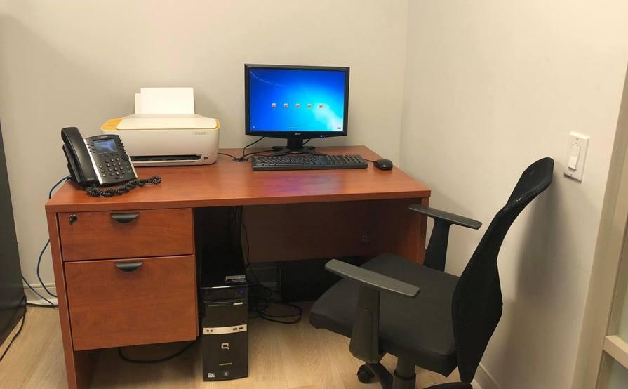 Desk with shared common area/kitchen/reception Desk with shared common area/kitchen/reception