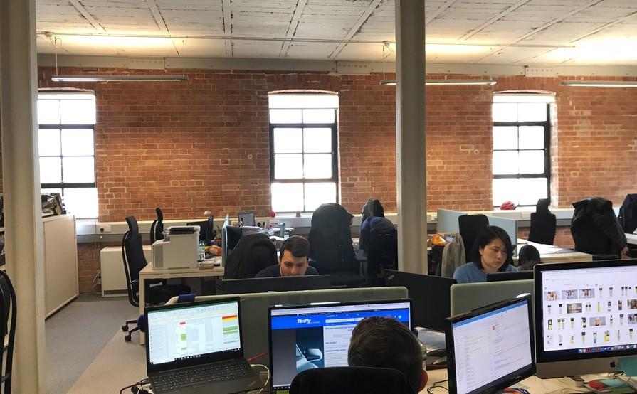 DESKS IN LIGHT AIRY TOP FLOOR WITH HIGH CEILINGS AND LARGE WINDOWS DESKS IN LIGHT AIRY TOP FLOOR WITH HIGH CEILINGS AND LARGE WINDOWS