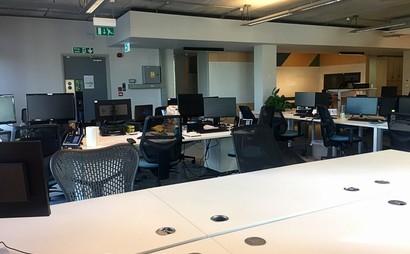 Flexible desk options in energetic office Flexible desk options in energetic office