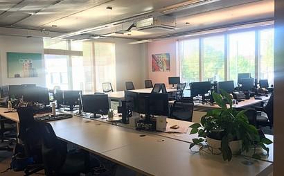 Flexible desk options in energetic office Flexible desk options in energetic office